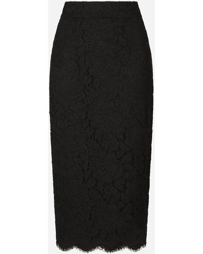 Dolce & Gabbana Falda midi de encaje elástico con logotipo - Negro
