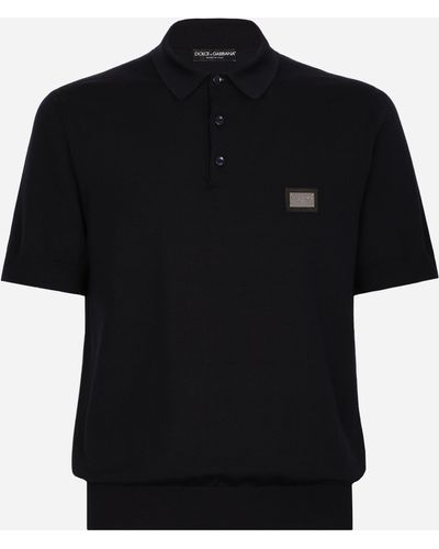 Dolce & Gabbana Poloshirt aus Wolle mit Logoplakette - Schwarz