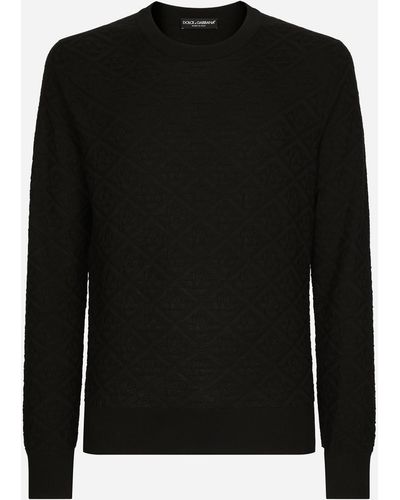 Dolce & Gabbana Rundhalspullover aus Seide DG-Logo allover - Schwarz