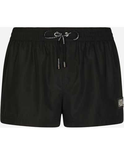 Dolce & Gabbana Short swim trunks with branded tag - Schwarz