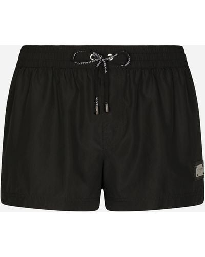 Dolce & Gabbana Boxer da mare corto con placchetta logata - Nero