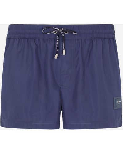 Dolce & Gabbana Boxer da mare corto con placchetta logata - Blu