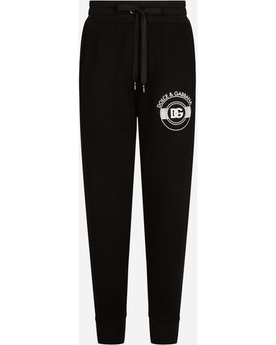 Dolce & Gabbana Pantalone jogging in jersey stampa logo DG - Nero