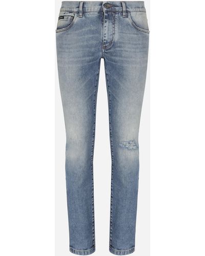 Dolce & Gabbana Jeans skinny stretch azzurro con rotture - Blu