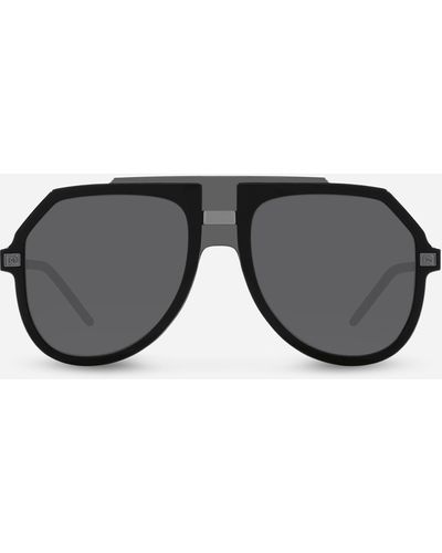 Dolce & Gabbana Lunettes de soleil oversize à logo gravé - Noir