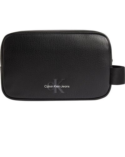Women's Calvin Klein Makeup bags and cosmetic cases from $45 | Lyst
