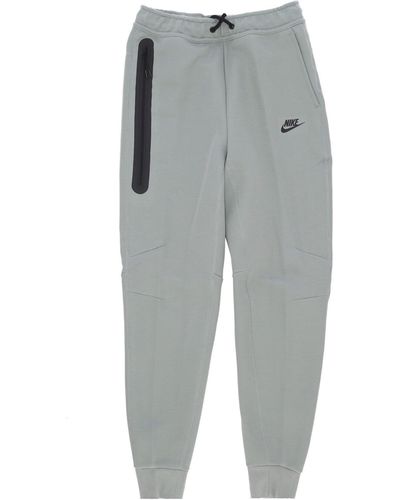 Nike Leichte Herren-Trainingshose, Tech-Fleece-Jogginghose, Glimmergrun/Schwarz - Grau