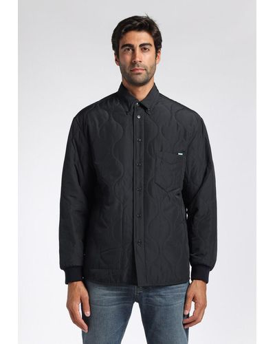 Covert Quilted Jacket Model Shirt With Pocket. Cuffs With Elastics - Black