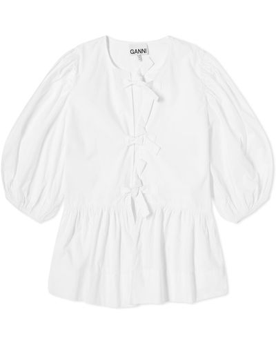 White Peplum Blouses