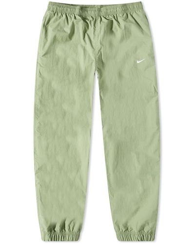 Nike Solo Swoosh Woven Track Pants Green for Men | Lyst