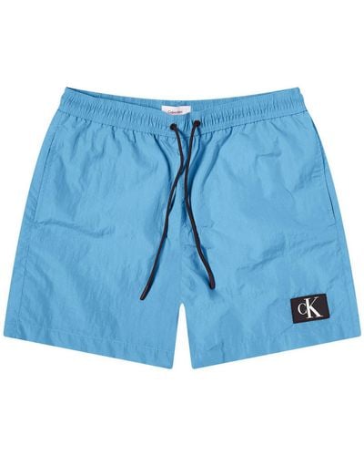 Calvin Klein Monogram Logo Nylon Swim Shorts - Blue