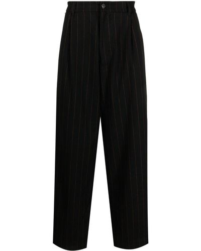 FAMILY FIRST Pleated Pinstripe Drop-Crotch Trousers - Black
