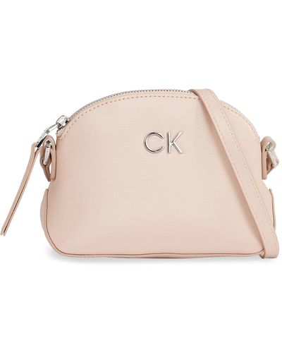 Calvin Klein Handtasche Ck Daily Small Dome_Pearlized K60K611880 - Pink
