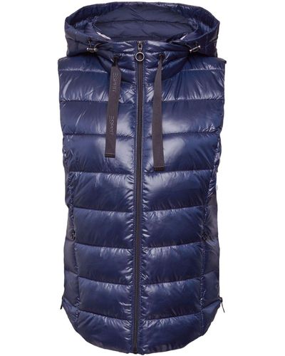 Esprit En matière recyclée : gilet matelassé à capuche amovible - Bleu