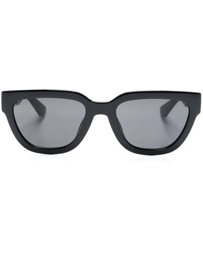 Gucci Lunettes de soleil à monture papillon - Gris