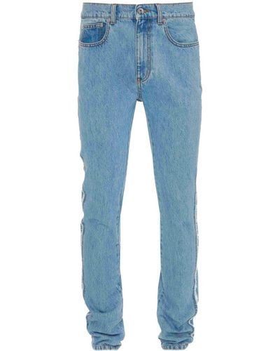 JW Anderson Jeans slim con applicazione - Blu