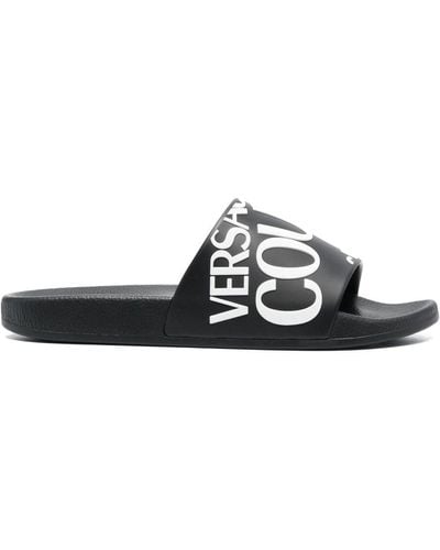 Versace Chanclas planas con logo - Negro