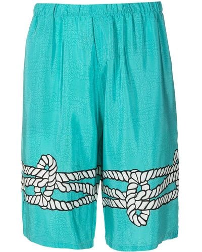 Amir Slama X Mahaslama Graphic-print Silk Bermuda Shorts - Blue