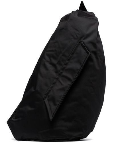 Eastpak X Raf Simons 'sleek Sling' Crossbody Logo Embellished Bag - Black