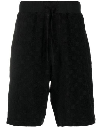 Ambush Pantalones cortos de deporte con monograma - Negro
