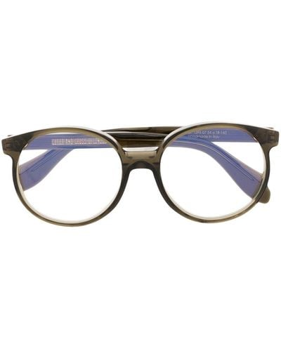 Cutler and Gross Runde Brille mit scheinend Design - Blau