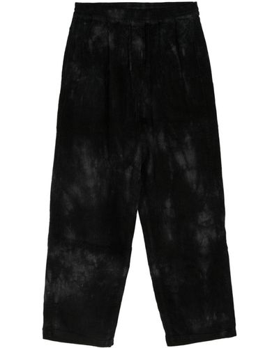 Aries Pantalones con motivo tie-dye - Negro