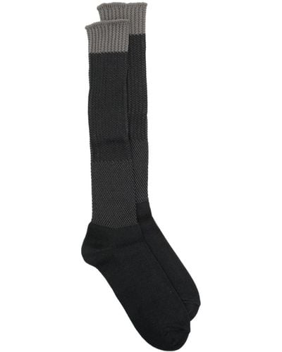 Homme Plissé Issey Miyake Logo-print ribbed socks - Nero