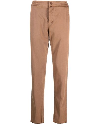 Kiton Pantalones ajustados con parche del logo - Neutro