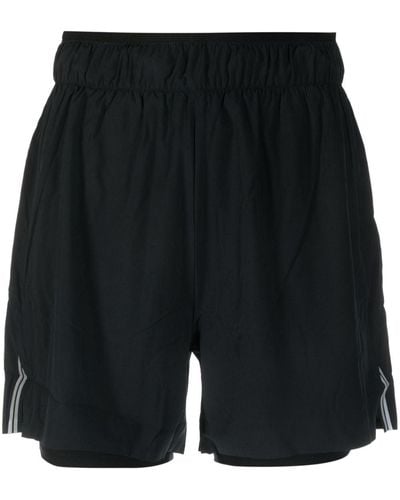 Rossignol Pantalones cortos con logo estampado - Negro