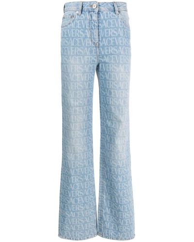 Versace Weite Jeans mit Print - Blau