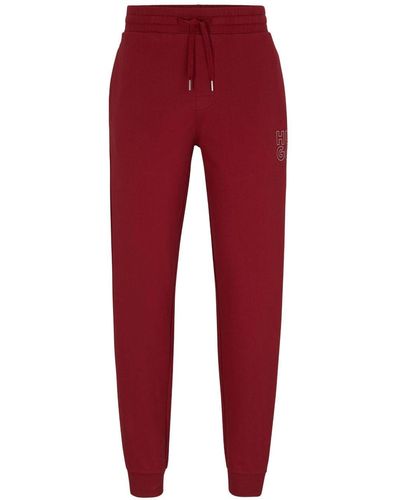 HUGO Pantalones de chándal con logo - Rojo