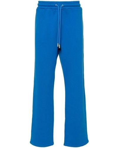 Off-White c/o Virgil Abloh Pantalones de chándal con logo bordado - Azul