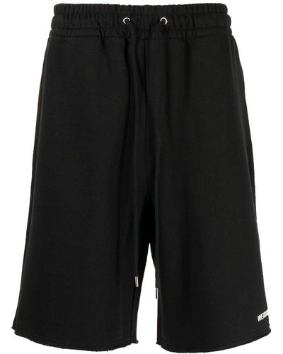 we11done Pantalones cortos de deporte con logo estampado - Negro