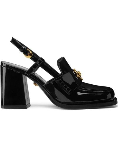 Versace Schwarze sandalen mit absatz und kristallverzierungen