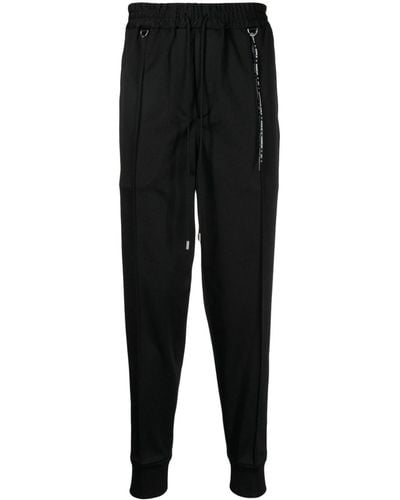 MASTERMIND WORLD Pantalones de chándal con logo y cordones - Negro