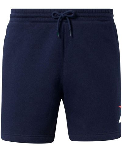 Reebok Pantalones cortos de deporte con logo estampado - Azul