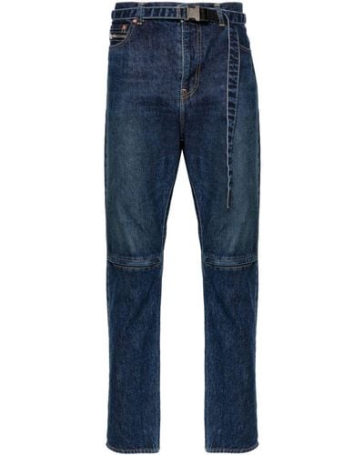 Sacai Jeans Met Toelopende Pijpen En Ceintuur - Blauw