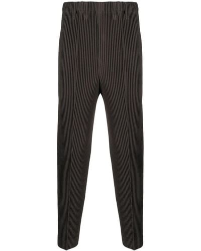 Homme Plissé Issey Miyake Compleate Tapered Plissé Knitted Trousers - Black