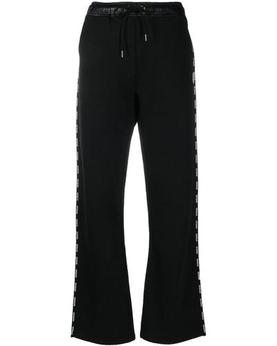 Moncler Pantalon ample à patch logo - Noir