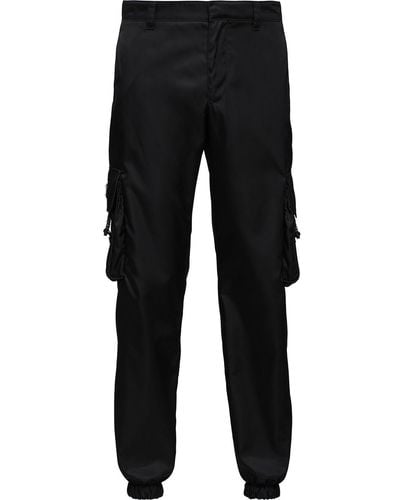 Prada Re-nylon Buckle-embellished Tapered Slim-fit Recycled-nylon Trousers - Black