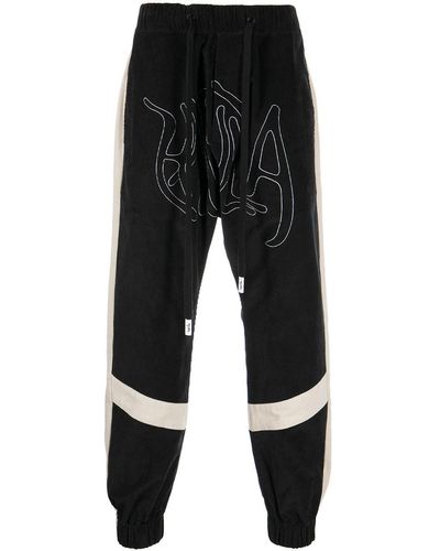Haculla Embroidered-logo Drop-crotch Trousers - Black