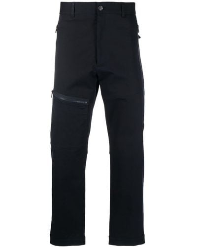 Moncler Pantalones ajustados con parche del logo - Azul