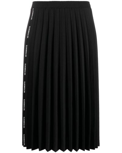 Vetements Falda plisada con banda del logo - Negro