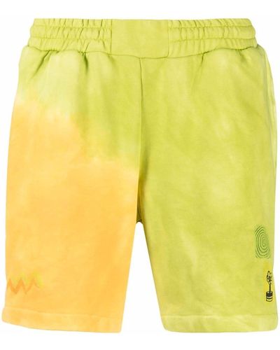 McQ Pantalones cortos de deporte con estampado gráfico - Amarillo