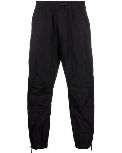DSquared² Pantalones de chándal ajustado con detalle de cremalleras - Negro