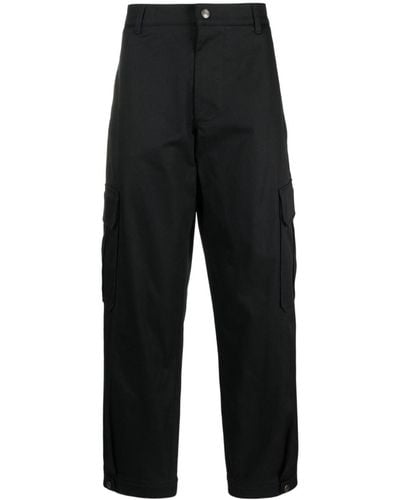 Moschino Pantalones anchos con logo bordado - Negro