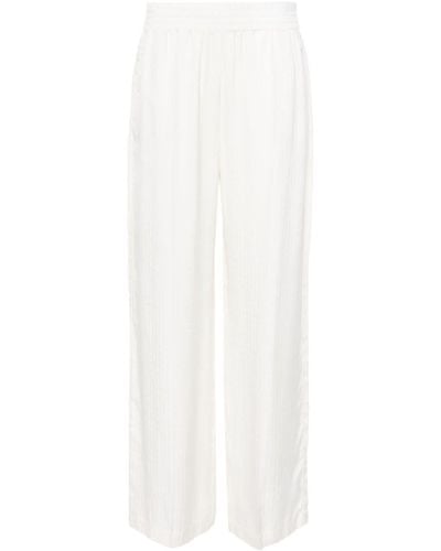 Victoria Beckham Pantalon à motif monogrammé - Blanc