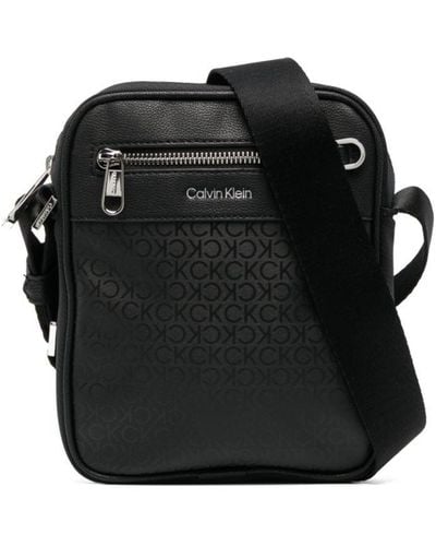 Calvin Klein Monogram-print Zipped Messenger Bag - Black