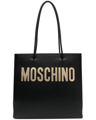 Moschino Sac porté épaule en cuir à patch logo - Noir