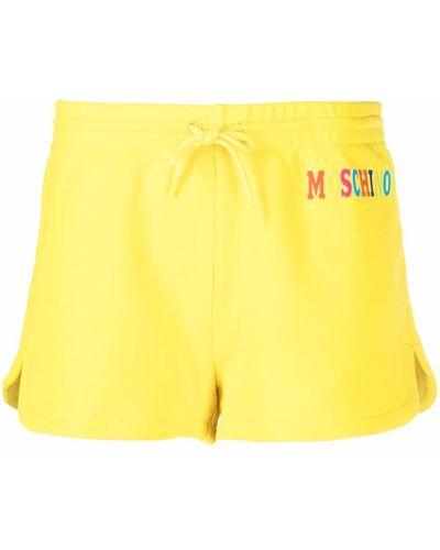 Moschino Pantalones cortos de chándal con logo estampado - Amarillo